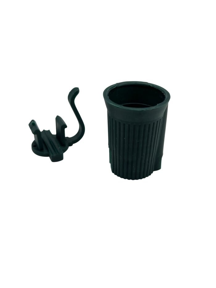 A black rubber ribbed utensil holder with a separate attachment piece, designed for attaching to the side of a table or counter. Perfect for those festive setups when installing Professional Christmas lights, the primary piece is cylindrical with vertical grooves, while the attachment has a hook shape for securing utensils.